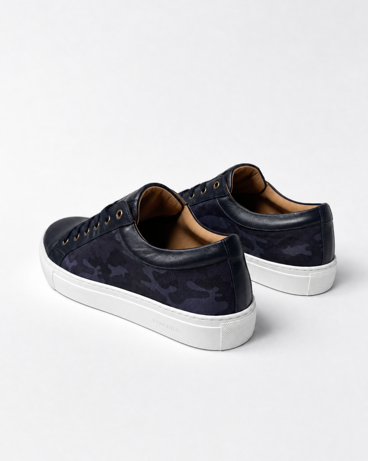 Bivando Midnight Camo Sneaker pair, rear three-quarter view: blue camo nylon, navy leather heel and white sole